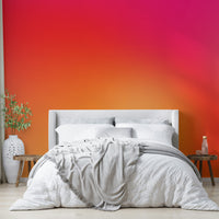 Fiery hot pink to orange wall mural for energetic home decor.

