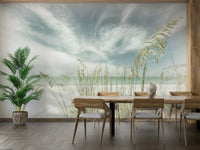 Soft beach tones and vintage design wallpaper for a serene look.

