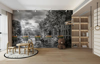 Bedroom wall featuring Herengracht night canal mural wallpaper

