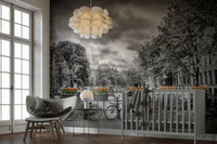 Urban Amsterdam wallpaper mural with canal and reflections

