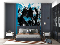 A dramatic ocean-inspired wallpaper with bold blue, black, and white brushstrokes resembling high tides.