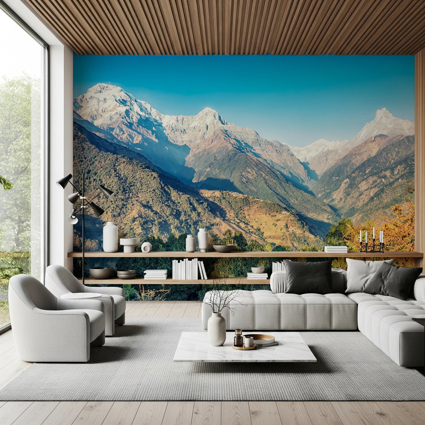 Snow capped range mural anchors elegant interior