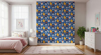 A colorful Christmas doodle wallpaper showing scattered festive motifs on a bold blue background.