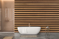 Horizontal Stripes Wood Various Design wallpaper in warm wood behind a white freestanding tub and glass shower in a bathroom