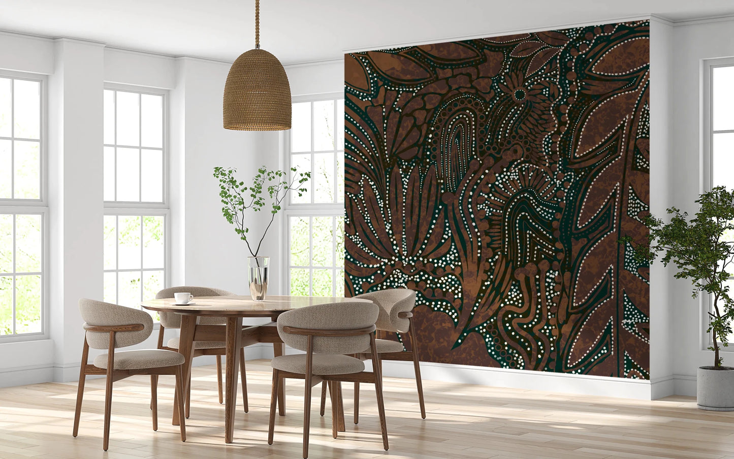 Indigenous Forest wall mural behind a round wood dining table and beige chairs by tall windows