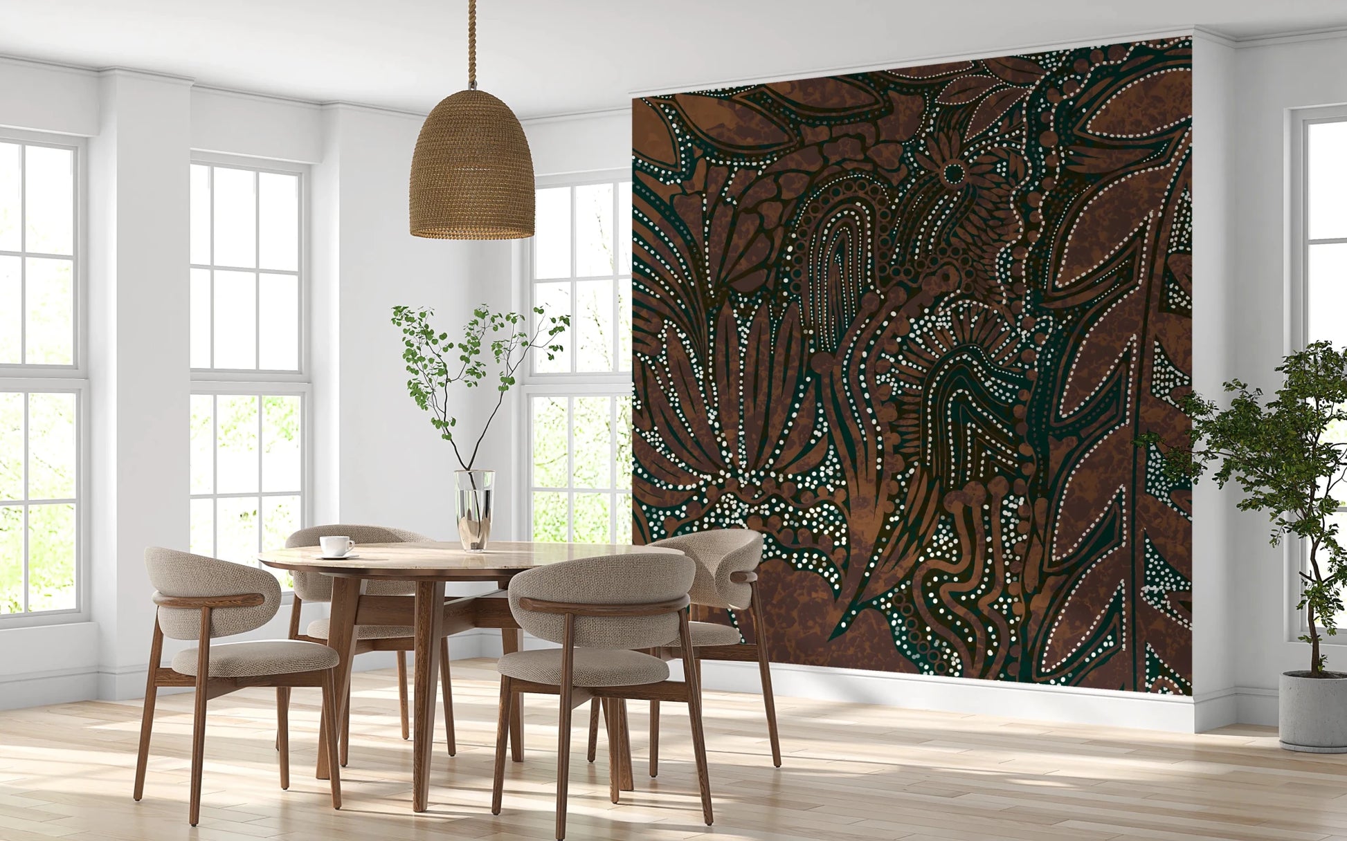 Indigenous Forest wall mural behind a round wood dining table and beige chairs by tall windows
