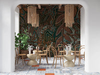 Indigenous Forest wall mural behind bentwood chairs and rattan pendants in a tiled-floor cafe