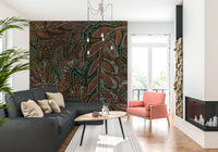 Indigenous Forest wall mural behind a dark grey sectional and coral armchair by a fireplace