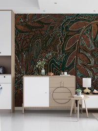 Indigenous Forest wall mural with teal and brown dot botanicals behind a light wood sideboard in an entryway