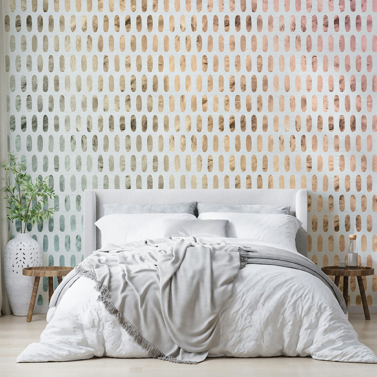 Subtle shimmer of iridescent ovals on soft white wallpaper.

