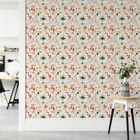 An artistic exotic fruit mural on minimalist wallpaper.

