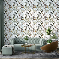 Hand-painted gold leaves on neutral beige wall


