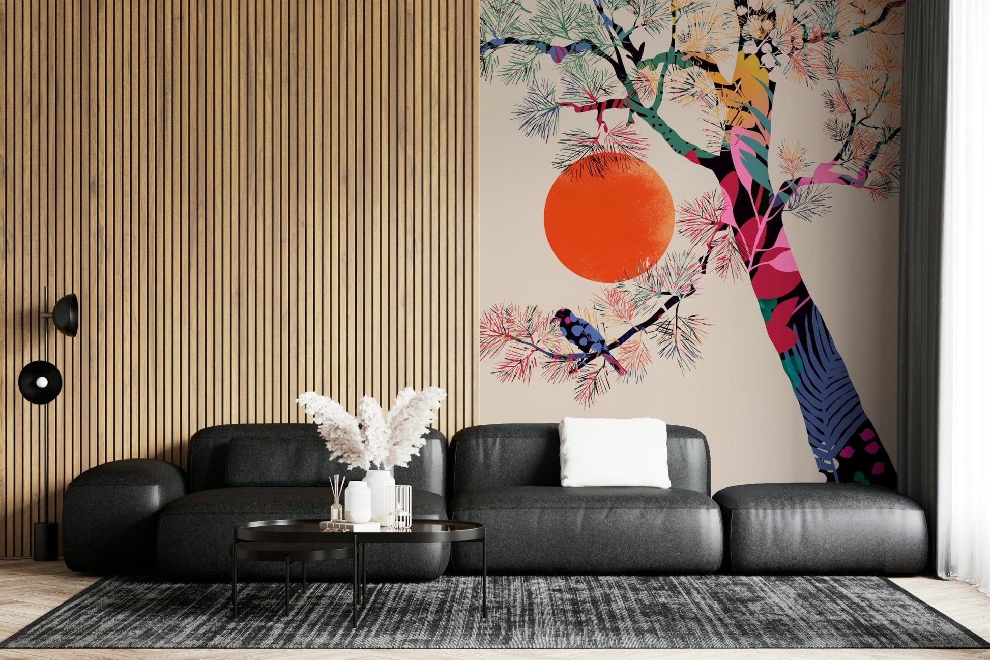 Japanese Summer wallpaper mural of a colorful pine tree and orange sun behind a black sofa in a lounge