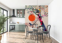 Japanese Summer wallpaper mural of tree and orange sun beside a green kitchen and black bentwood chairs