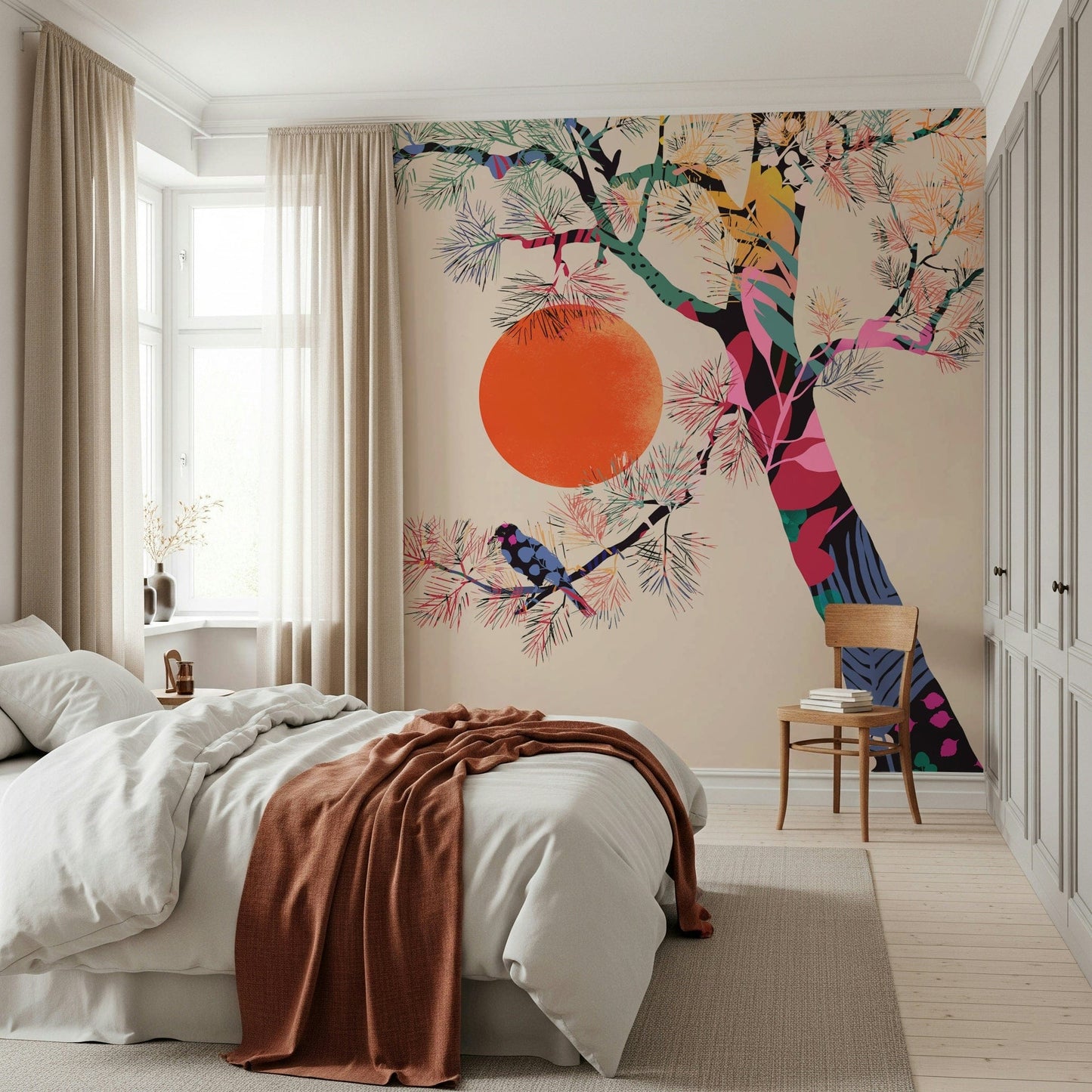 Japanese Summer wallpaper mural with a vivid tree and orange sun behind a white bed with a rust throw