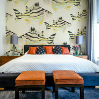 Artistic fish design mural with soft, fluid patterns and vibrant hues.

