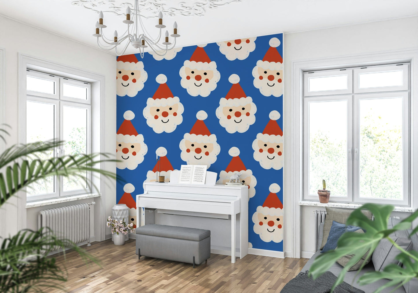 Repeating cartoon Santa faces on a vibrant blue wallpaper for a fun holiday look.