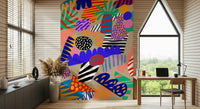 Bright abstract wallpaper featuring a mix of tropical motifs, bold colors, and quirky geometric patterns.