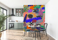 A lively wallpaper with tropical leaf shapes and colorful patterns creating a fun jungle jive look.