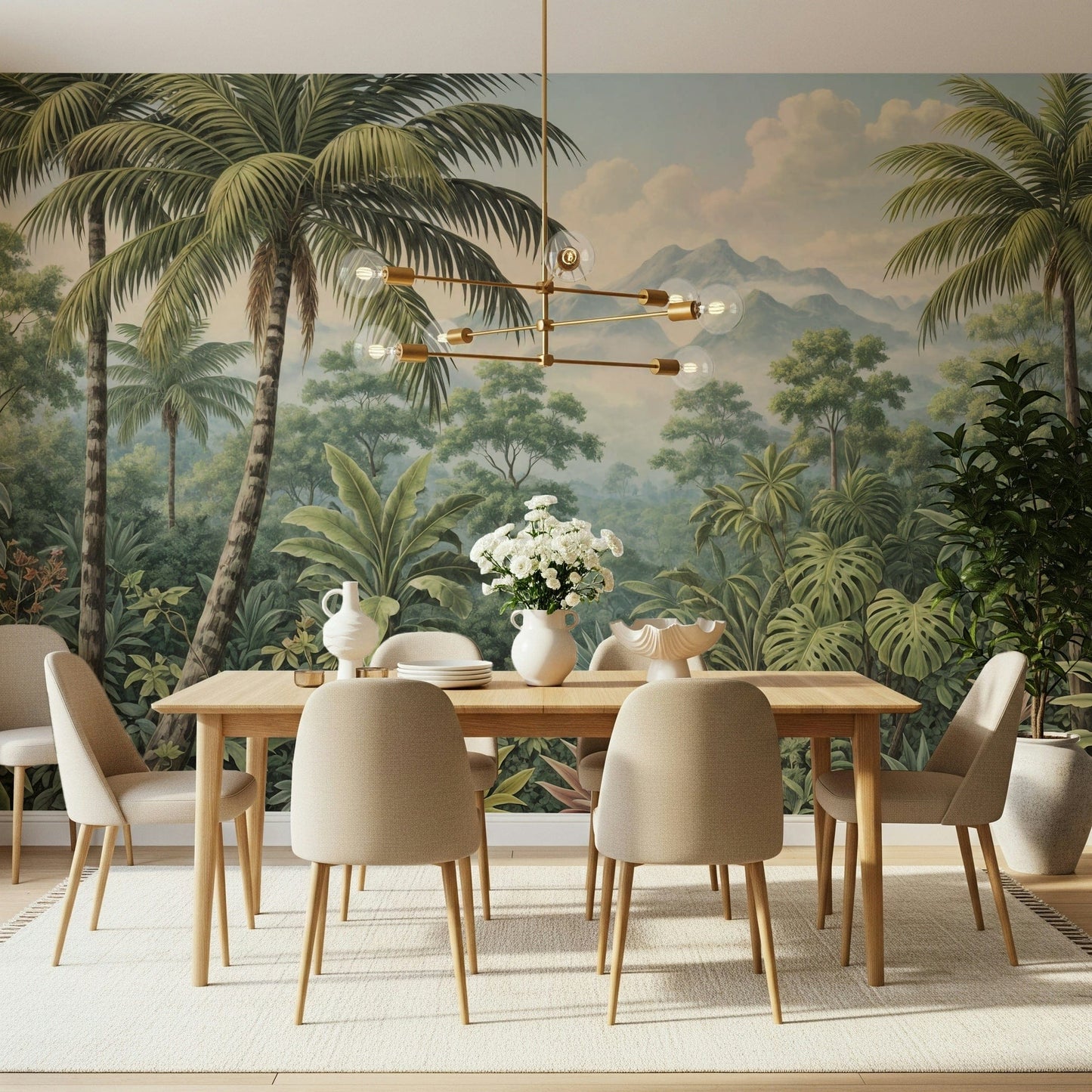 Jungle Vista wallpaper mural of green palms and misty mountains behind a wood dining table and beige chairs