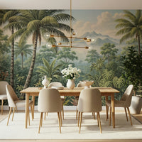 Jungle Vista wallpaper mural of green palms and misty mountains behind a wood dining table and beige chairs