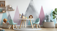 Playful nursery play room wall mural with whimsical hand-drawn mountain ranges.