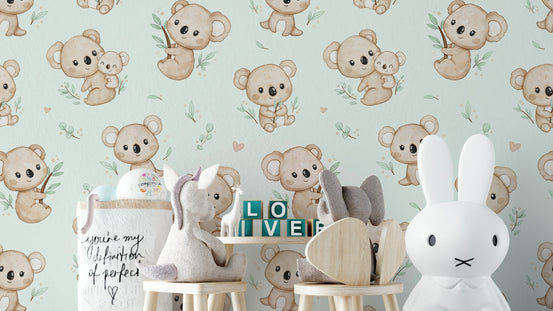 Koala Cuddles mint wallpaper in a kids playroom with plush toys, wooden LOVE blocks and a Miffy bunny lamp