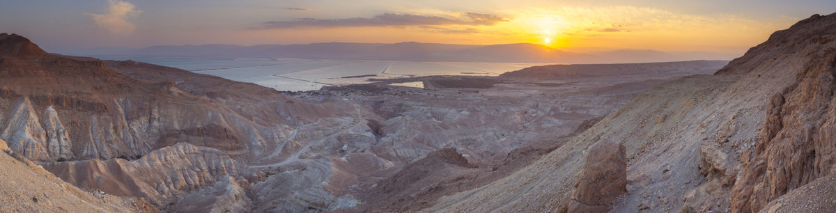 Tranquil Dawn Over Arid Lands Wall Mural in your room