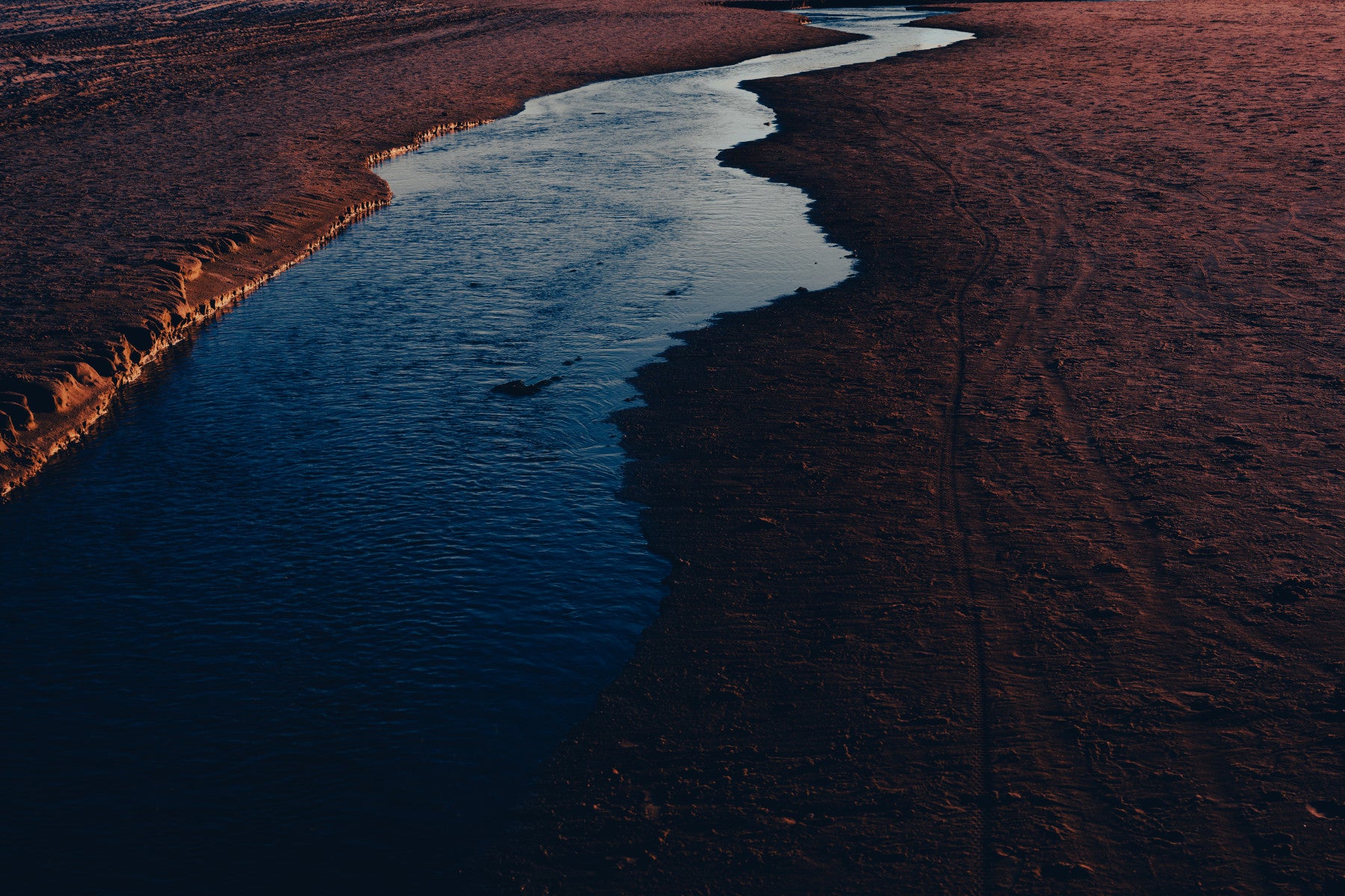 An angled shot of the mural's dark and serene color palette.

