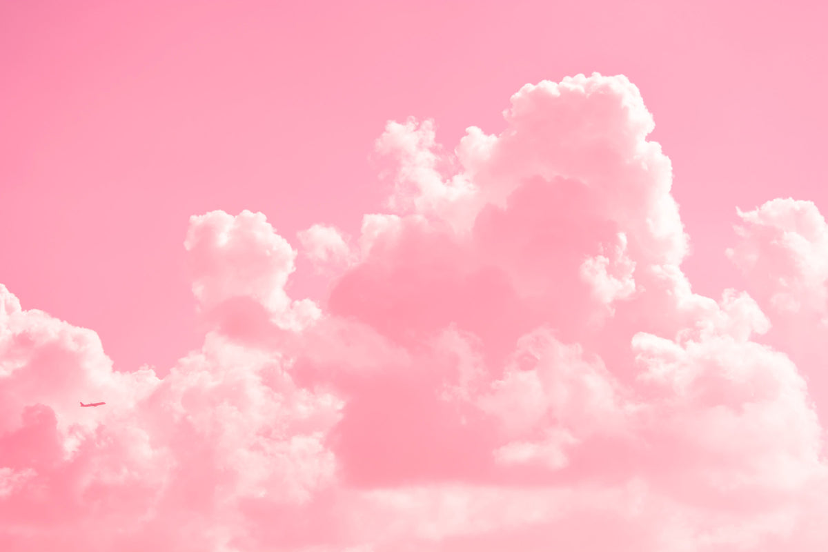Cloudy with a touch of Pink Wall Mural in your room