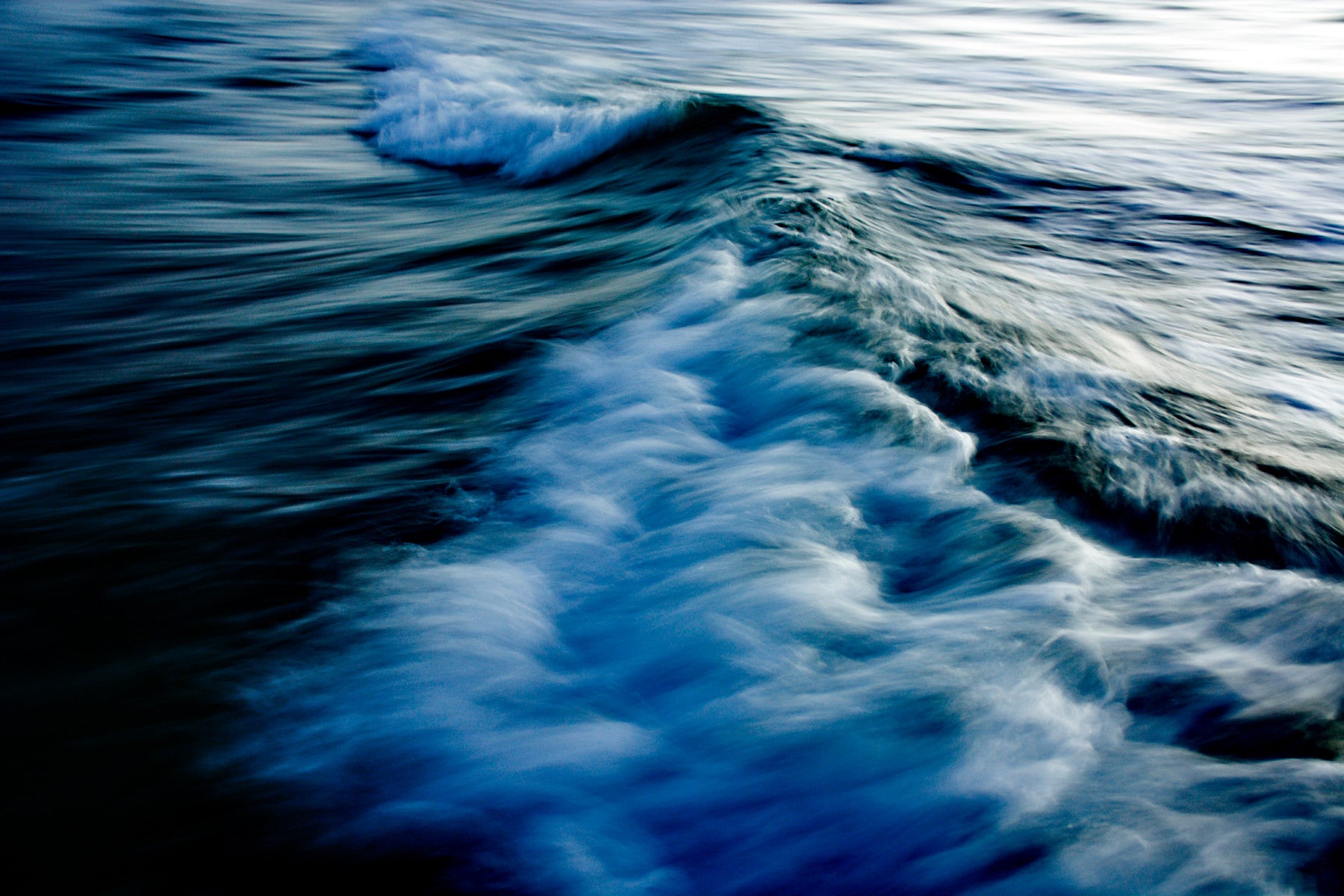 A contemplative wave texture wallpaper mural for a feature wall.


