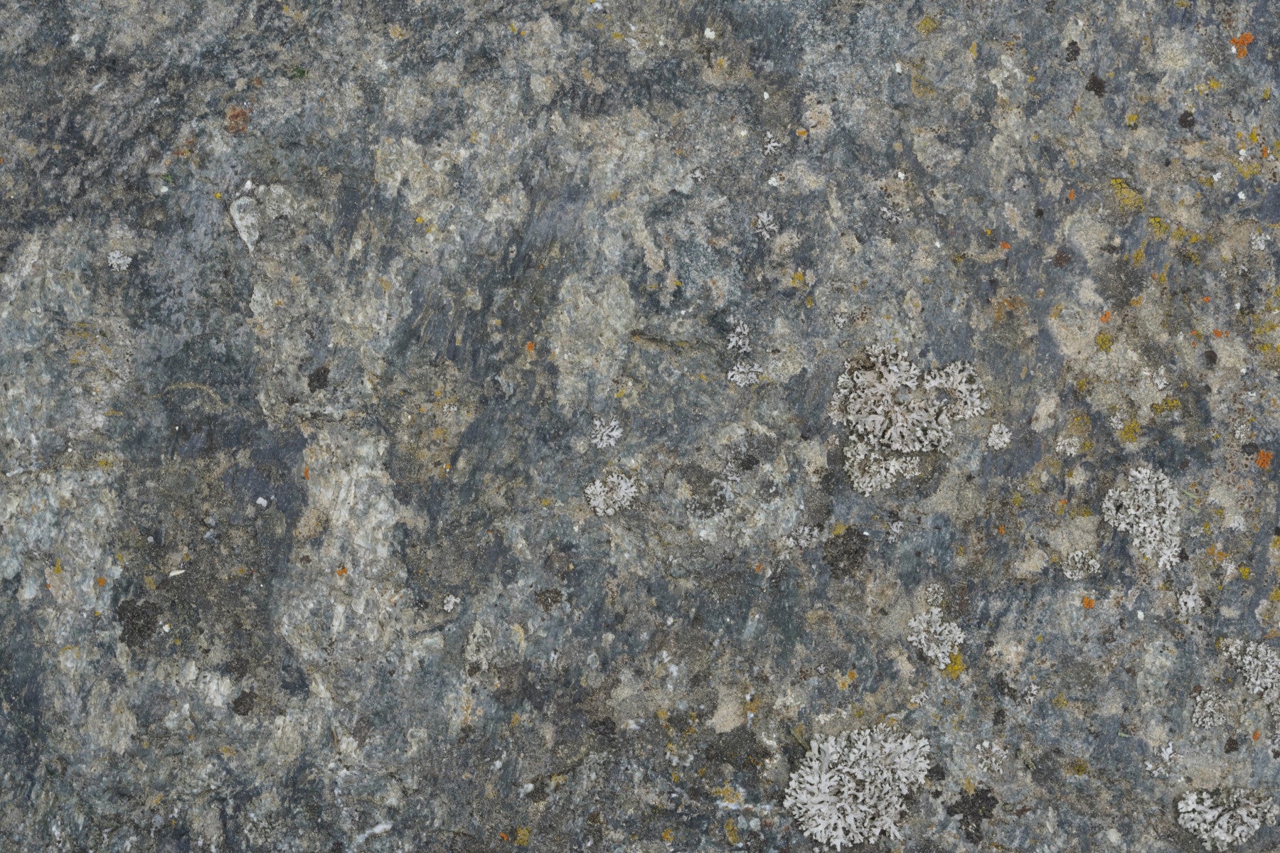 Stone-inspired wallpaper showcasing smooth, whisper-like textures and muted hues.