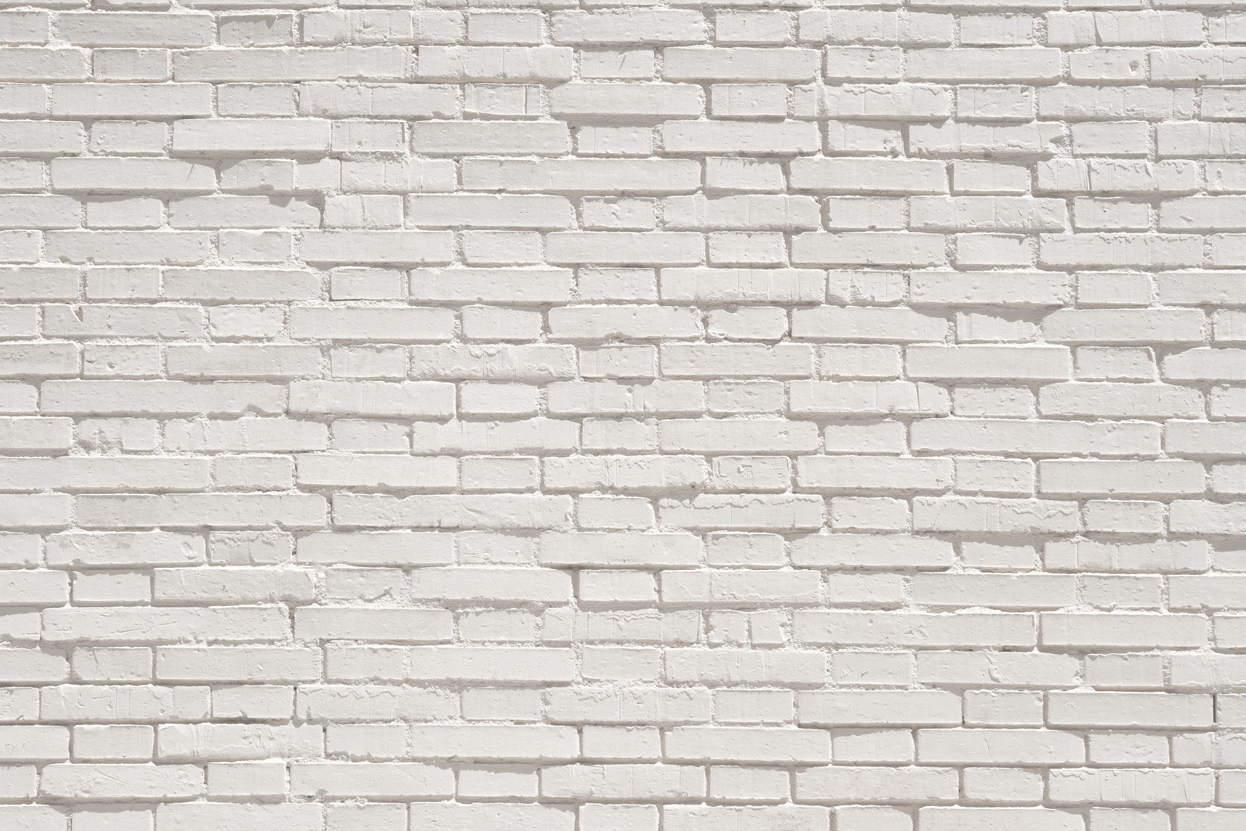 Textured white brick wall mural adding brightness, depth, and architectural interest to interiors.