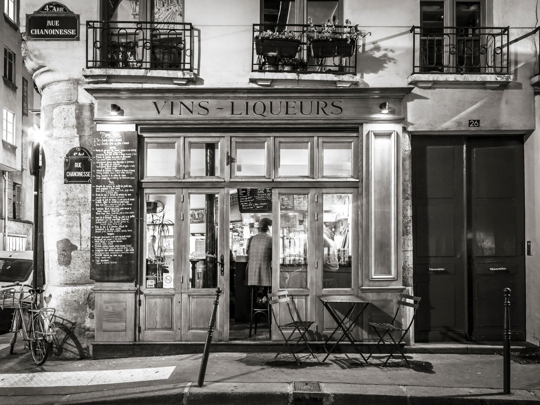 Noir style cafe exterior wallpaper, old Parisian architecture.
