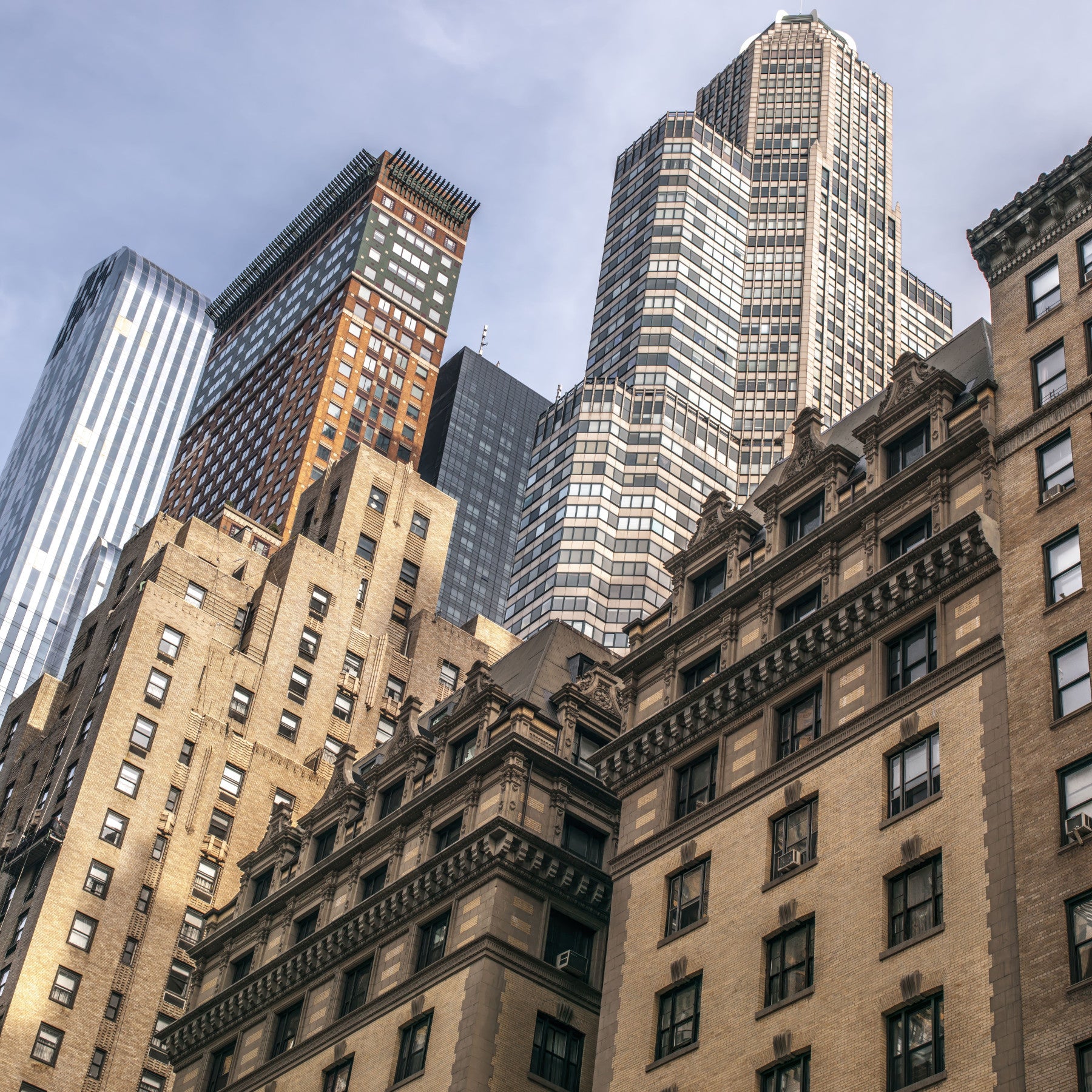 Metropolitan scene NYC wallpaper for walls, glass and stone urban density.