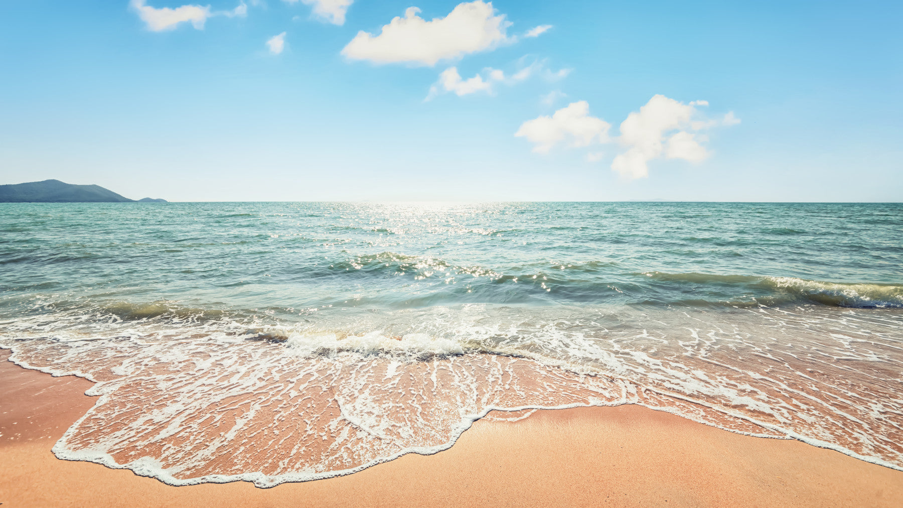 Serene, pristine beach Wall Mural