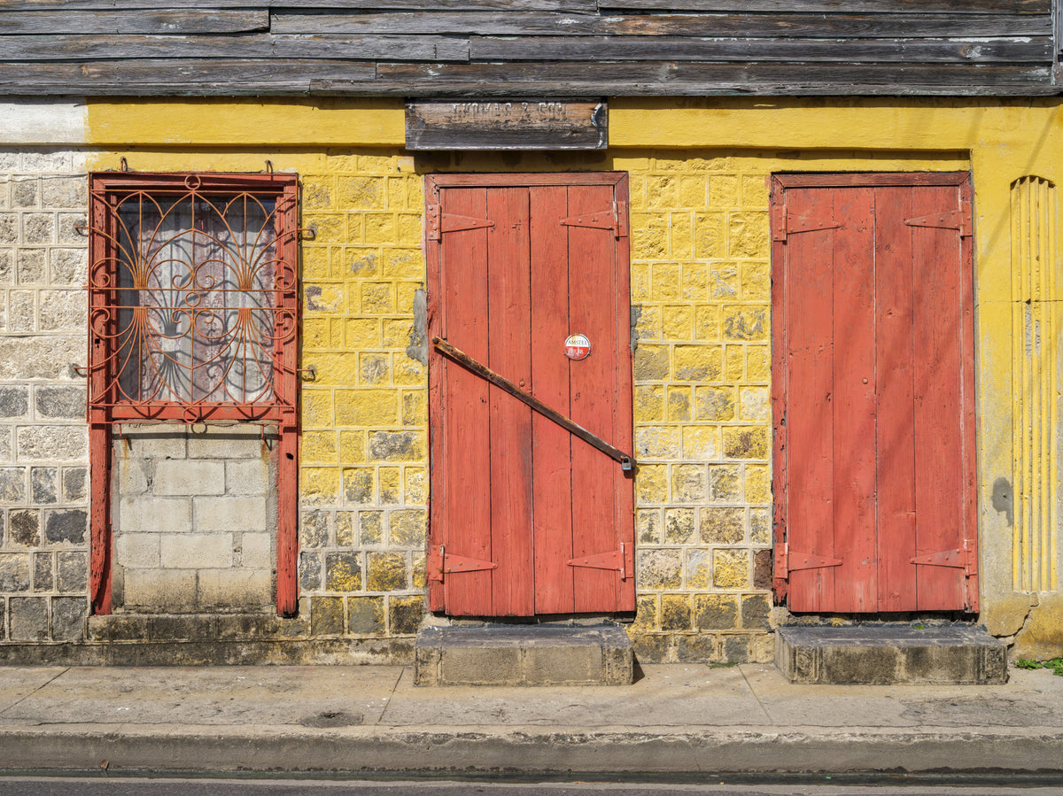Weathered Brick Wall and Red Doors Wall Mural in your room