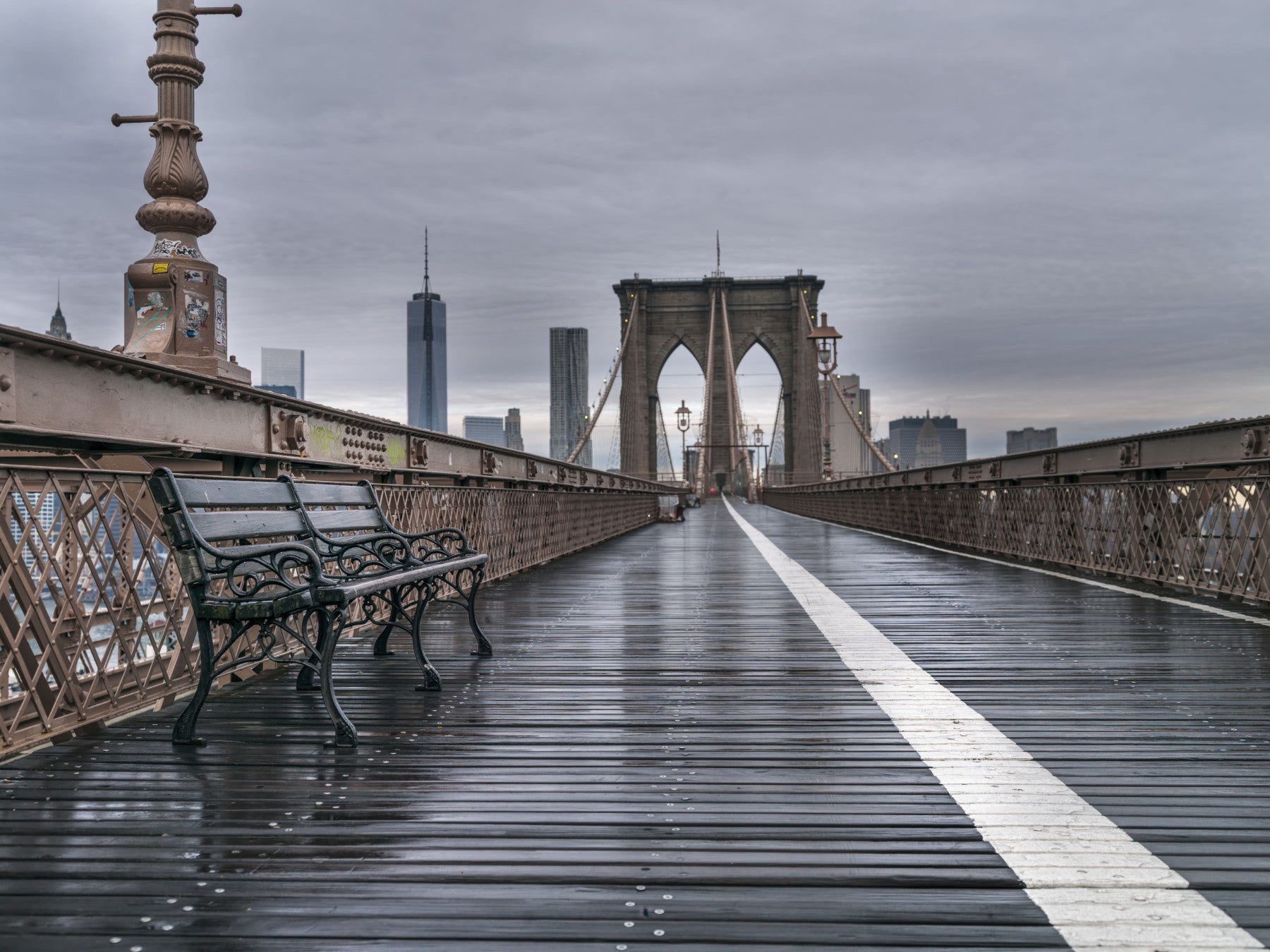 Gothic towers and suspension cables fill a dining room , Brooklyn Bridge Serenity wall mural