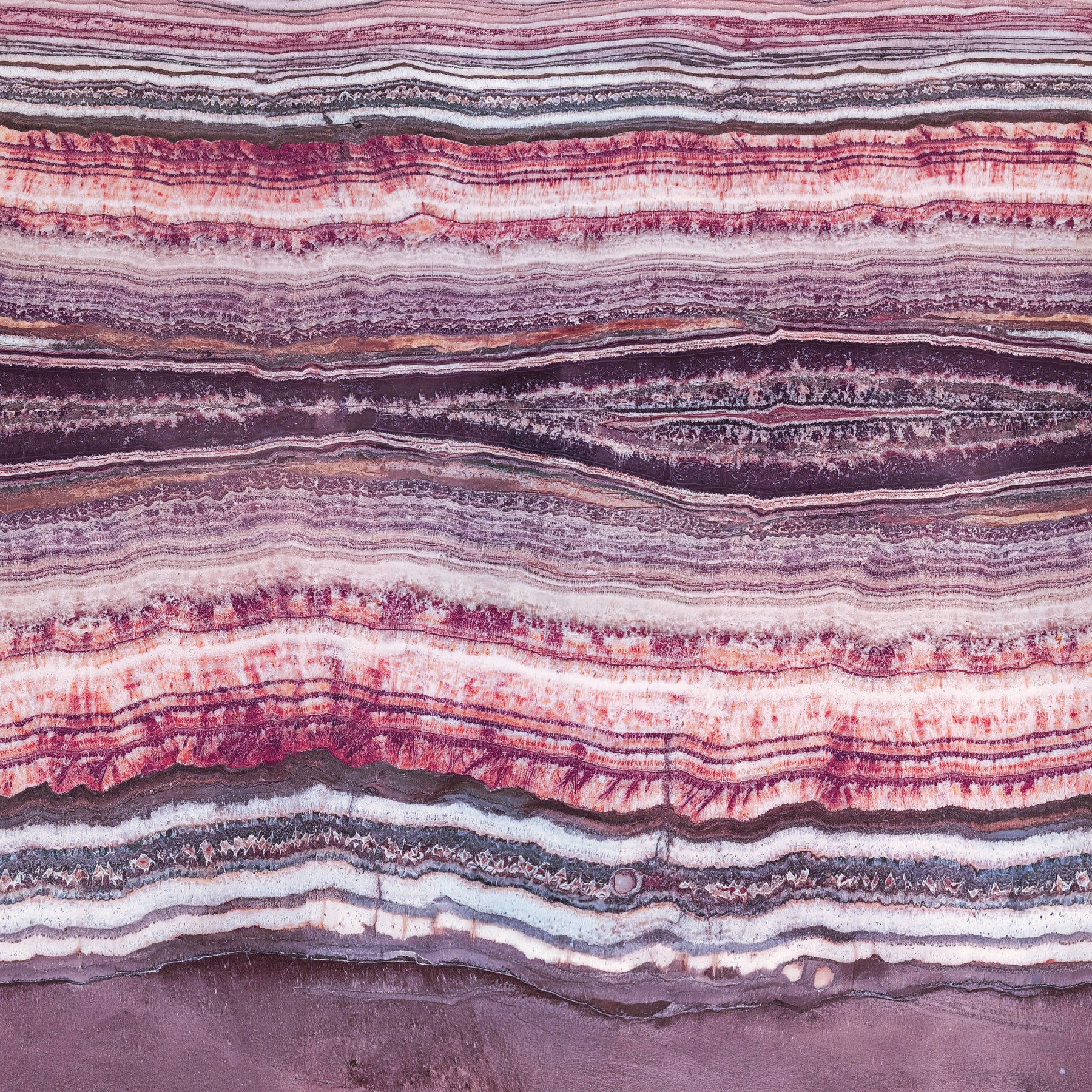 Crimson & Amethyst Strata wall mural keeps a restful tone in this bedroom.