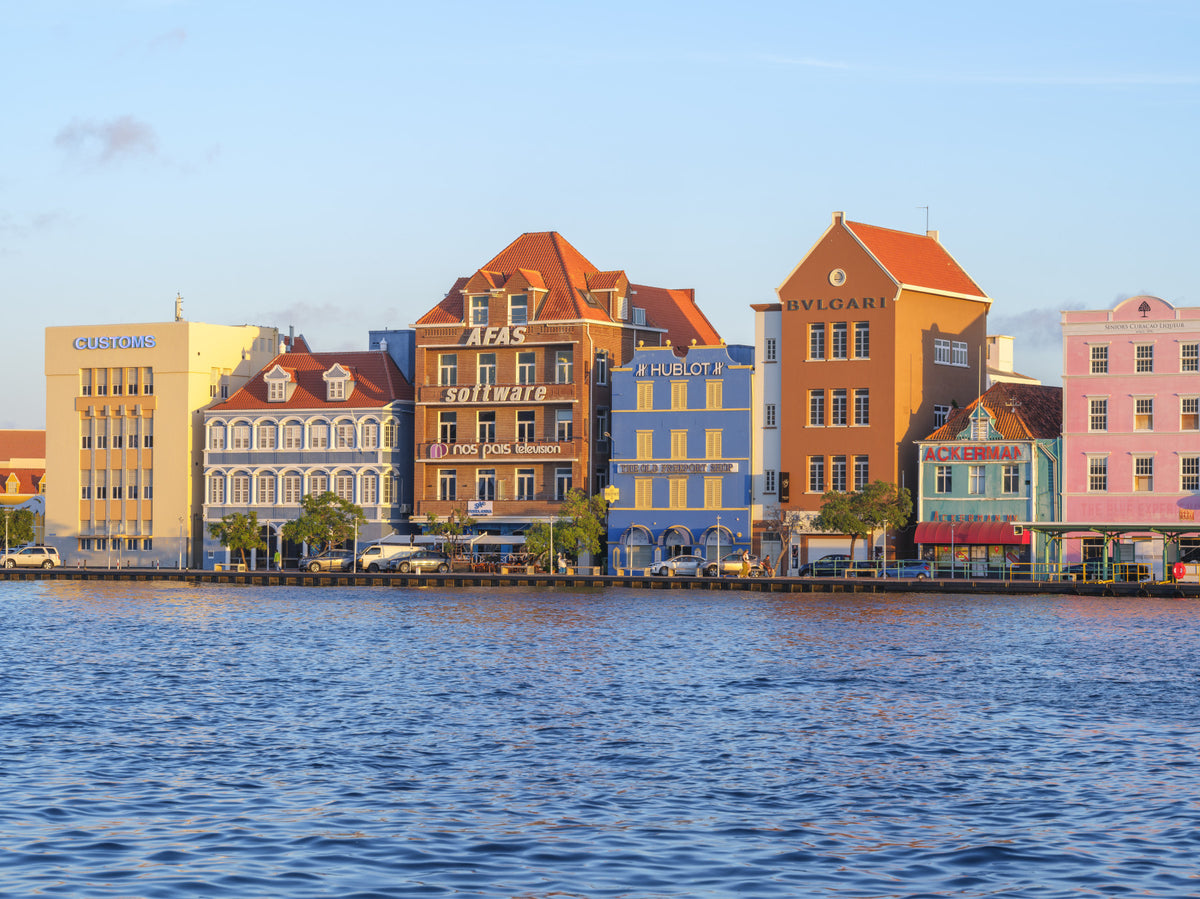 Harbor Hues of Willemstad Wall Mural in your room — zoomed