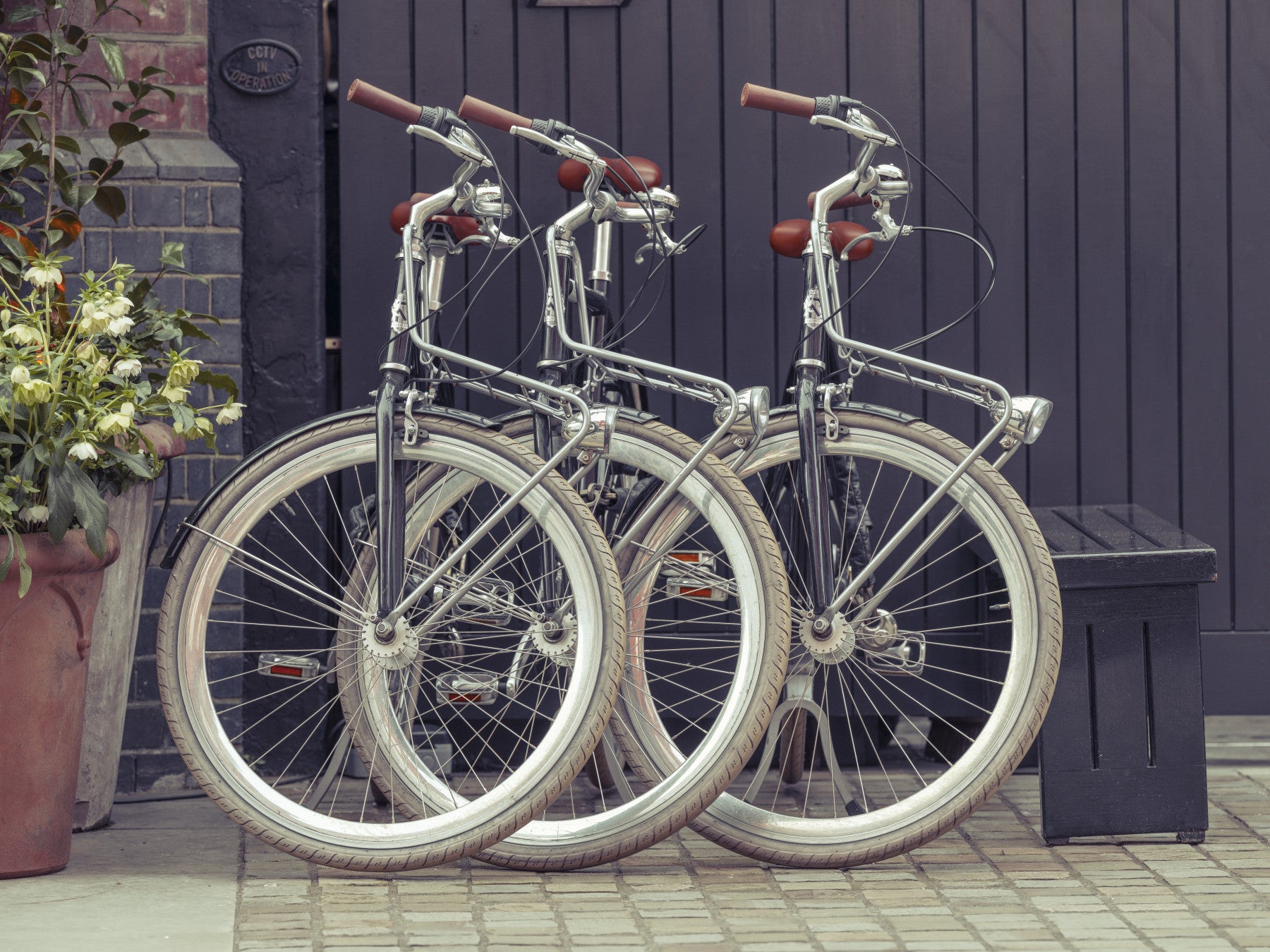 City bicycle wall mural with vintage inspired street scenery