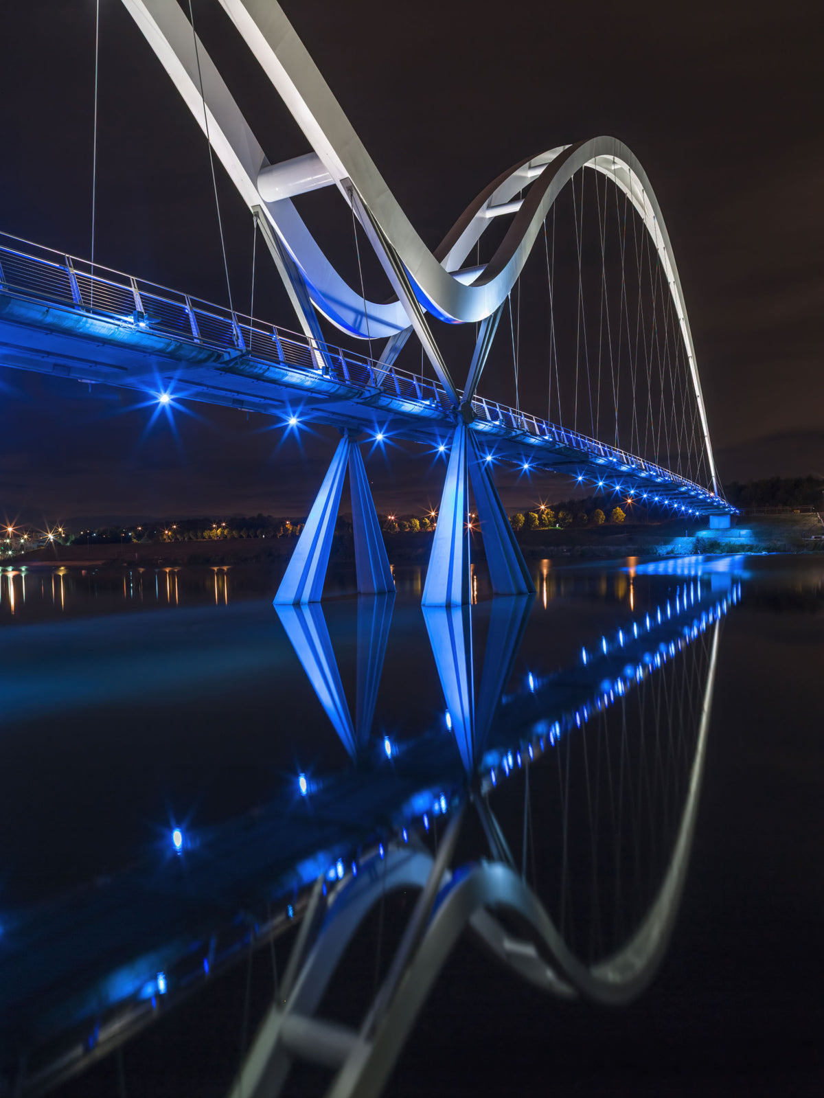 Stockton Infinity Bridge Nocturnal Glow Wall Mural in your room — zoomed