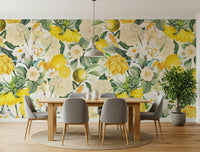 Lemon Tree Bloom Wall Mural – Vibrant mural of lemons ripening among lush foliage and springtime blooms.