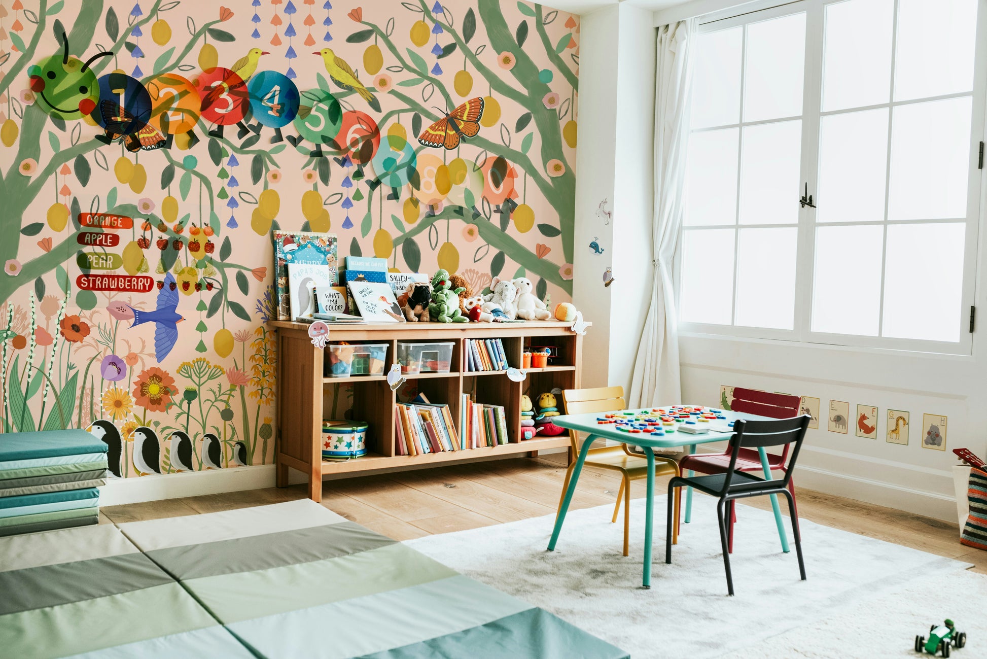 Yellow lemon and green leaf mural for a laundry room with clean lines and simple decor.