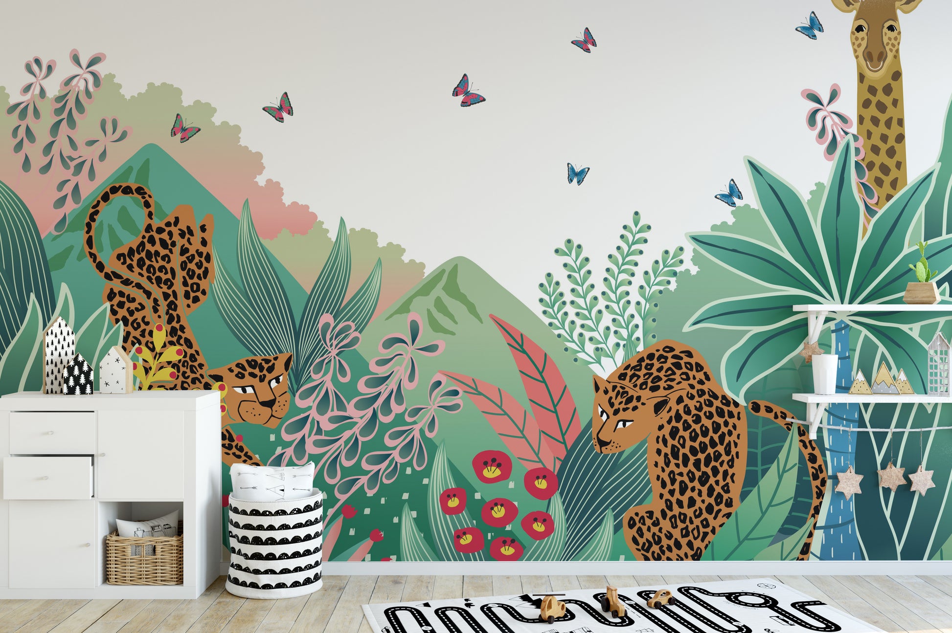 Leopard and Giraffe Kids wallpaper mural with leopards and a giraffe beside a white dresser in a kids room