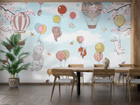 Levitating animals wallpaper mural styled along a hallway feature wall near a console in soft pastel tones