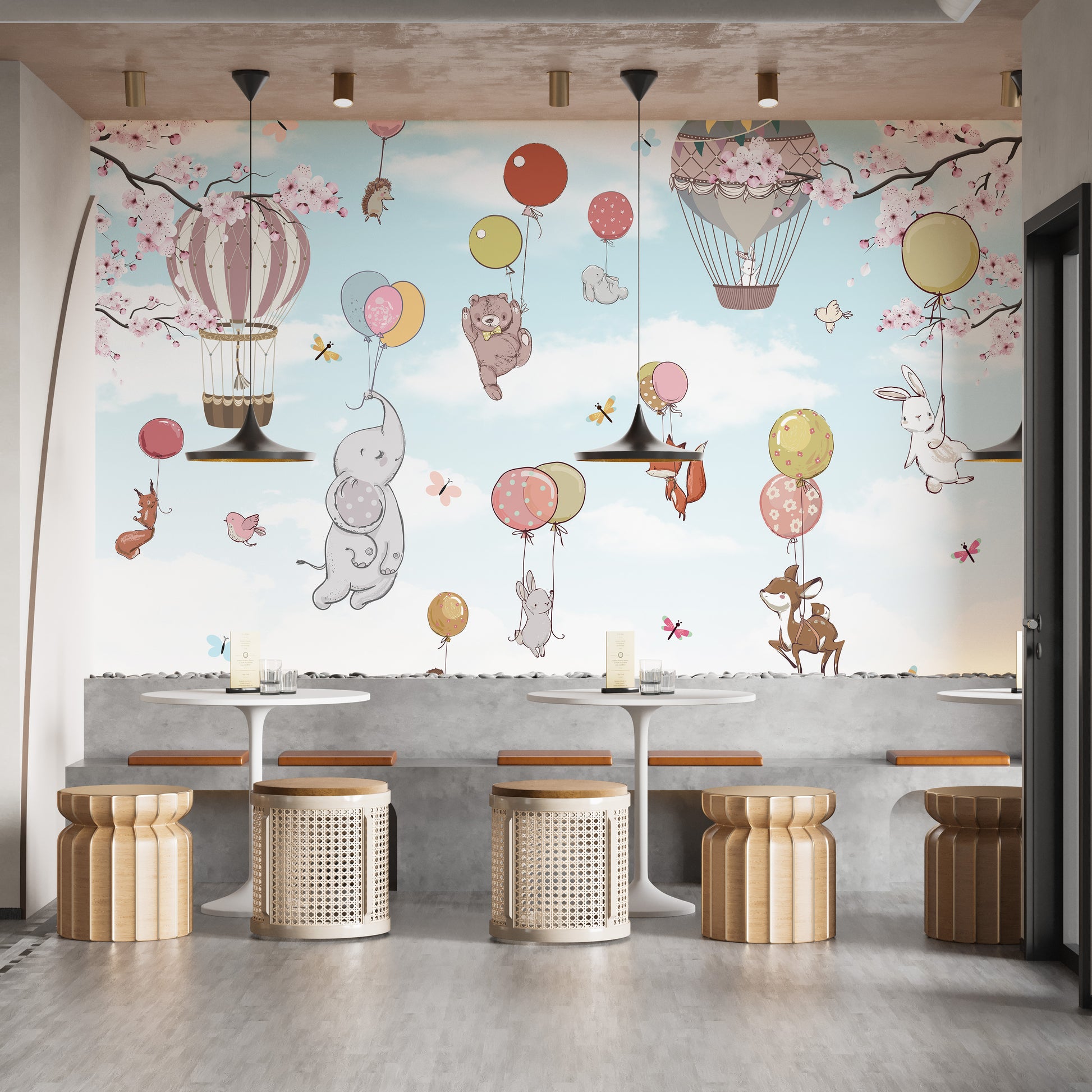 Levitating animals wallpaper mural as a feature wall in a home office workspace in soft pastel tones