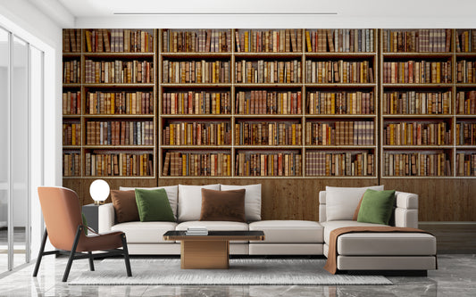 Library Bookcase wallpaper mural of wooden shelves full of books behind a white sofa and orange accent chair