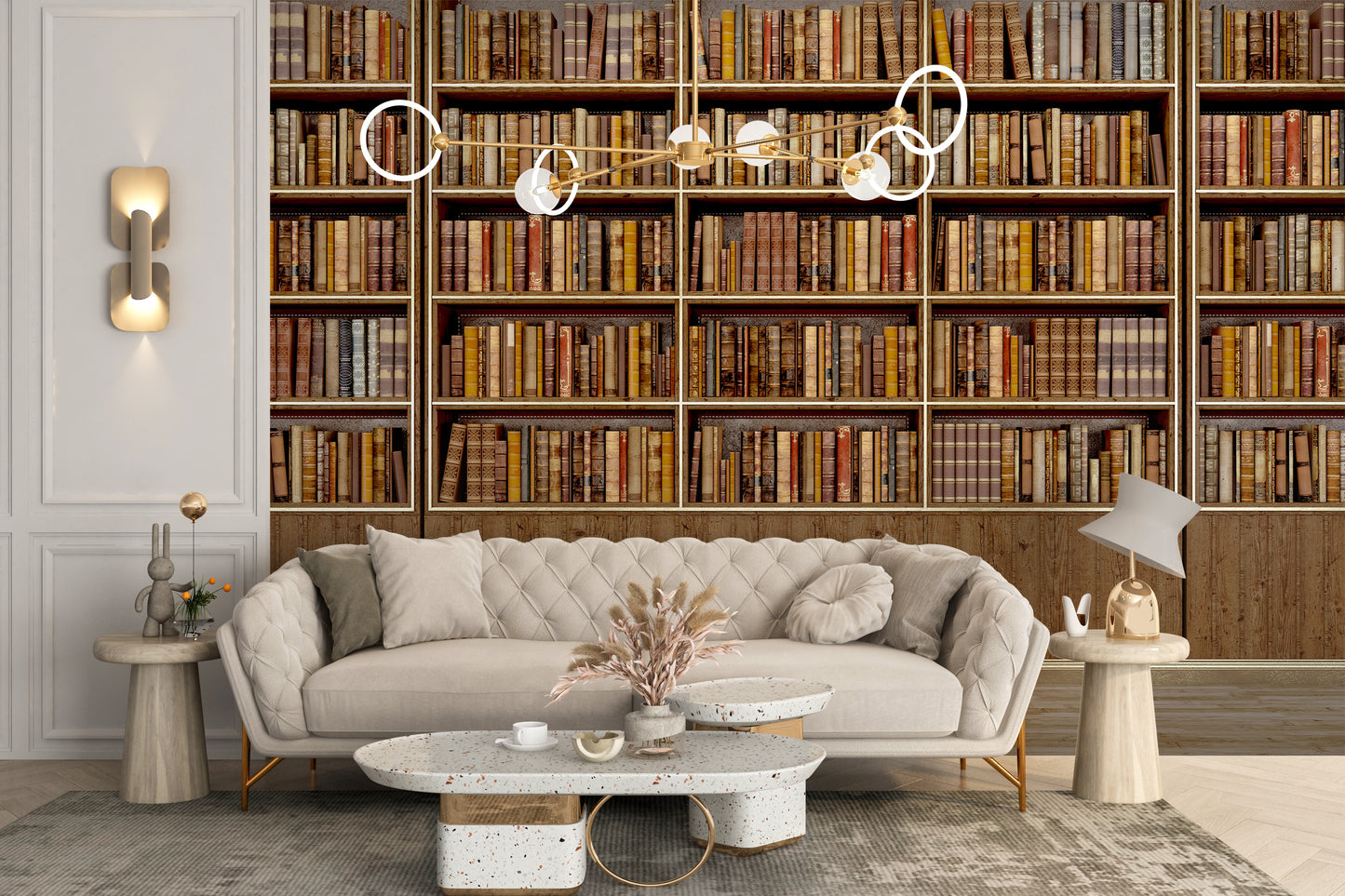 Library Bookcase wallpaper mural above a beige tufted sofa with terrazzo tables and a gold chandelier