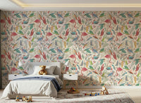 light Birdwatcher's wallpaper of pastel birds on cream behind a white kids bed with lamps and a teddy bear